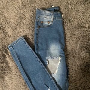 Fashion Nova Medium Wash Distressed Skinny Jeans